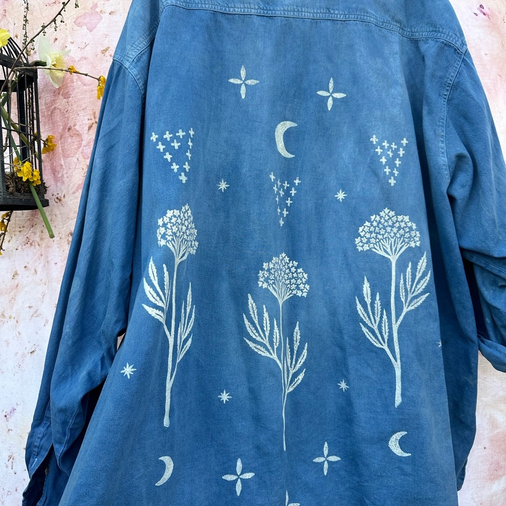 Blue Shirt with White Floral and Celestial Design